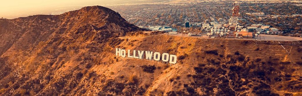 Hollywood sign on the the brown mountains of Los Angeles, CA
