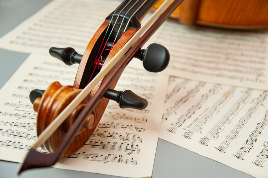 Educational performance tour for student travel by Educational Discovery Tours. A violin