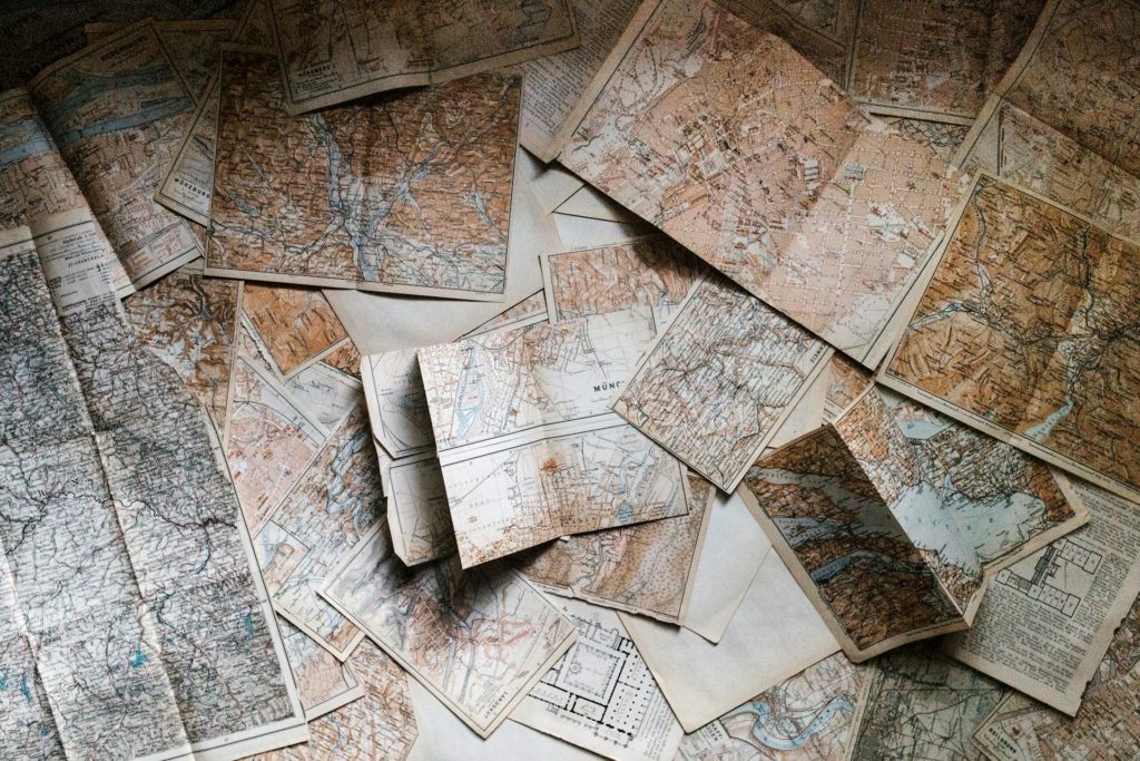 A huge pile of small maps all bunched up together exemplifying educational tours